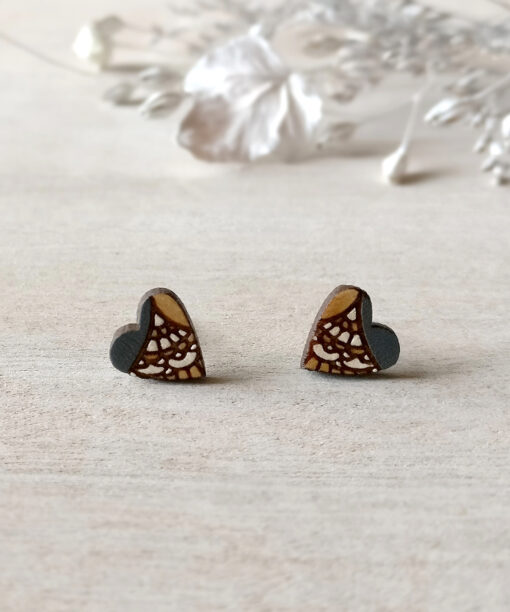 boho wooden heart studs in grey color on background