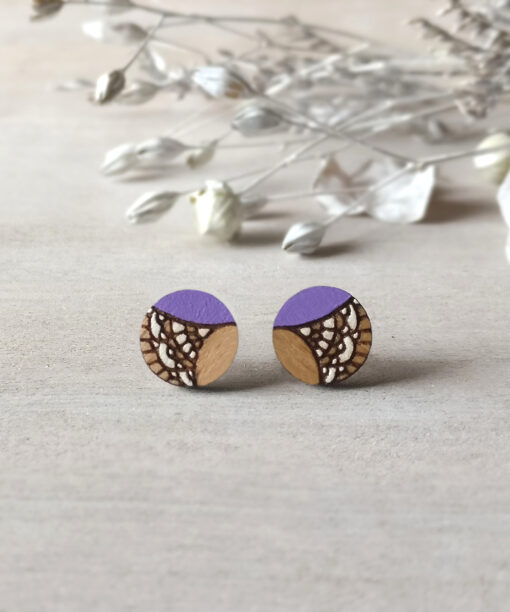 light purple wooden earrings mini round on background