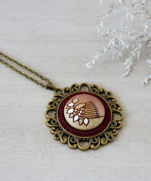 medium rose gold wooden necklace on background