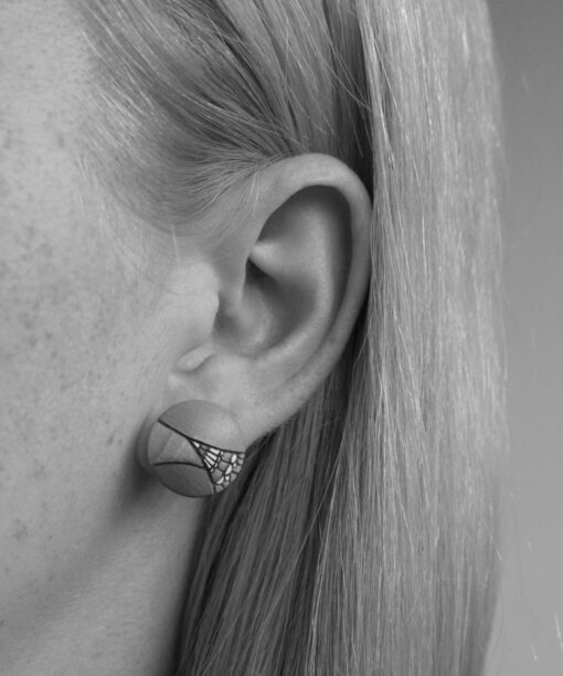medium wooden earrings geometric design on model