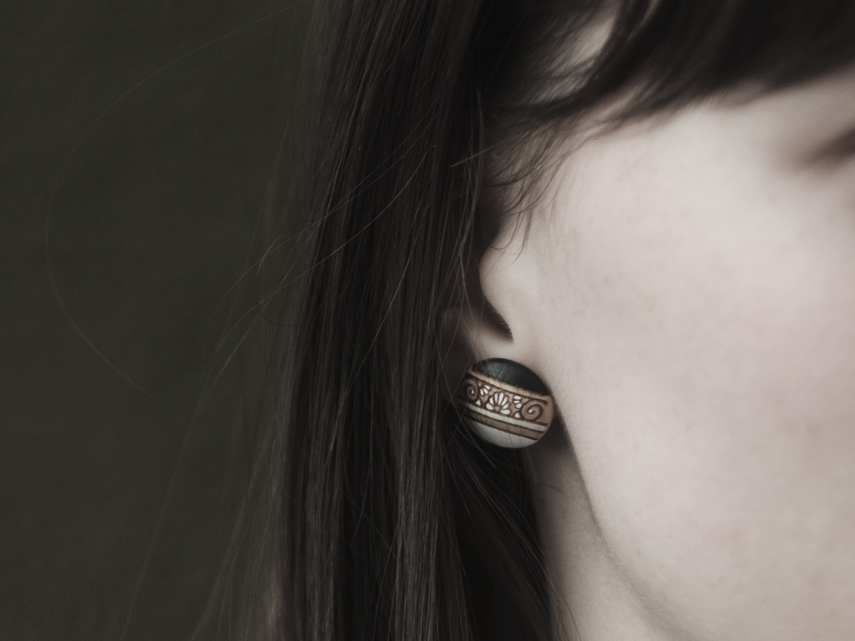 medium wooden earrings ornament design on model