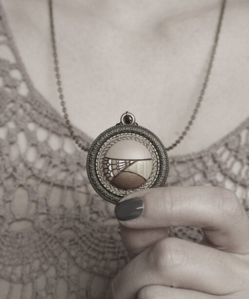 medium wooden necklace geometric design on model