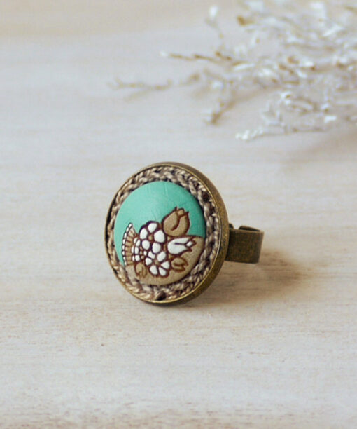 small mint wooden ring on background