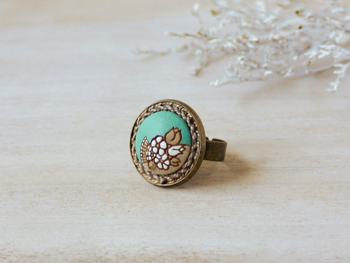 small mint wooden ring on background