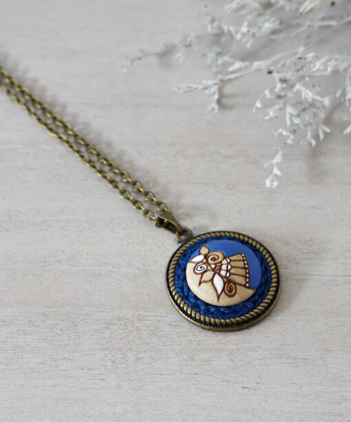 royal blue wooden necklace on background