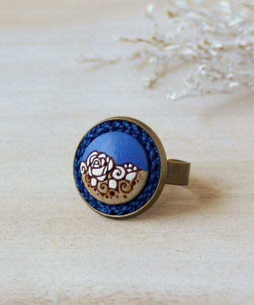 royal blue wooden ring on background