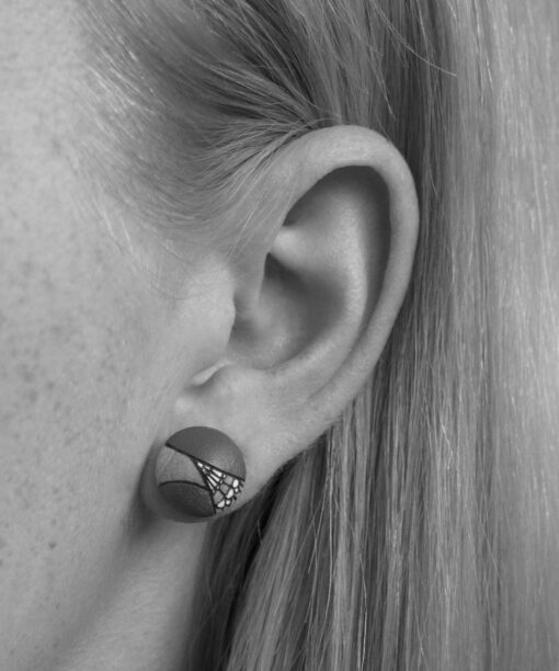 small wooden earrings geometric design on model