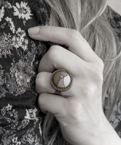 small round wooden ring geometric design on model