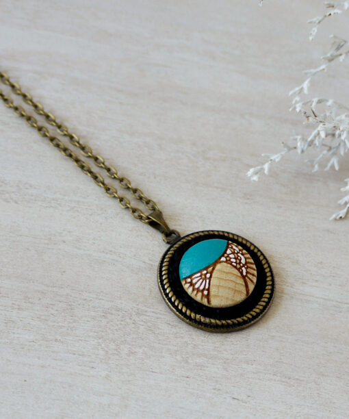 turquoise wooden necklace on background