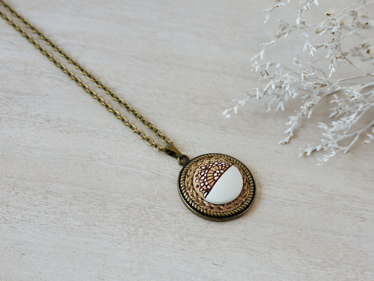 white wooden necklace on background