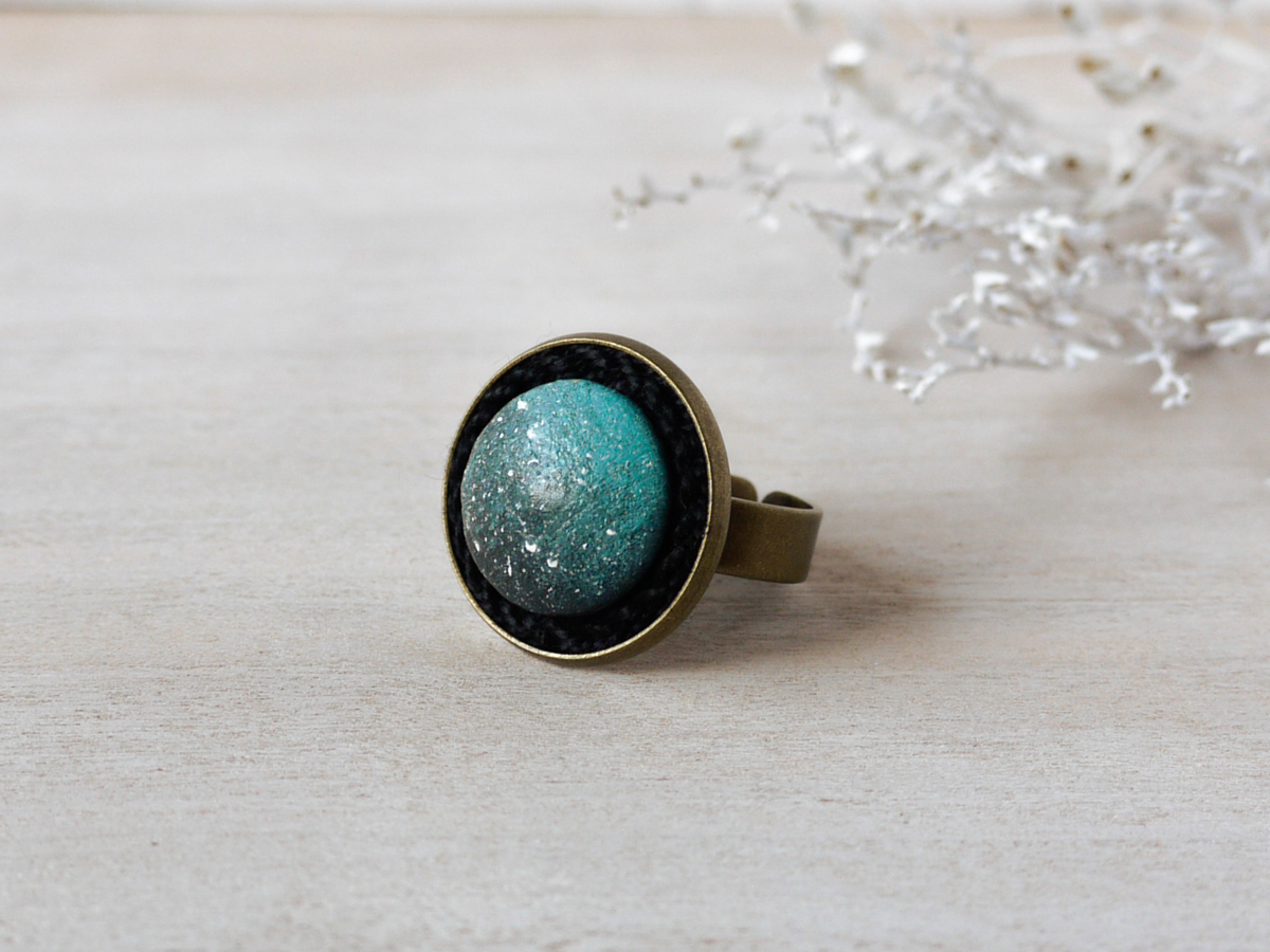 mint night sky wooden ring on background