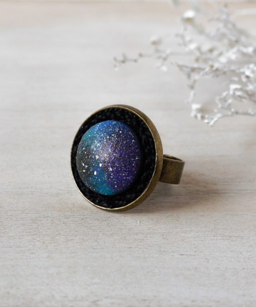 purple night sky wooden ring on background