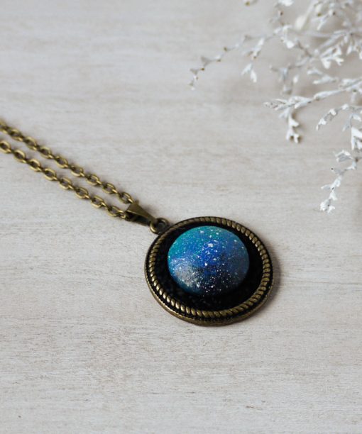 small blue night sky wooden necklace on background