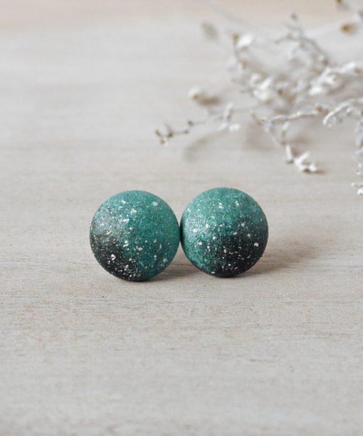 small mint night sky wooden earrings on background