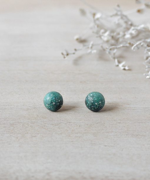 tiny mint night sky wooden earrings on background