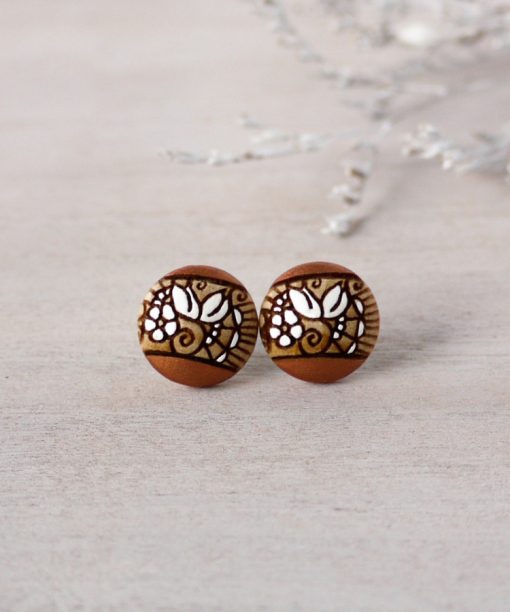 small wooden studs in copper color on background