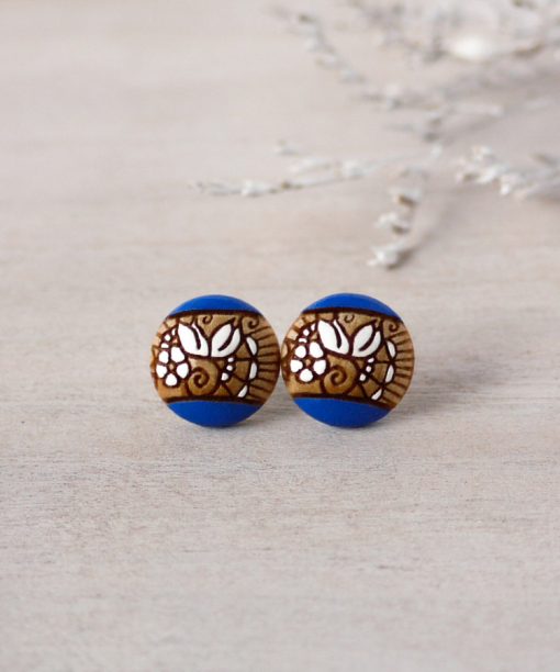 small wooden studs in royal blue color on background