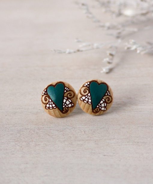 small wooden studs in teal color on background