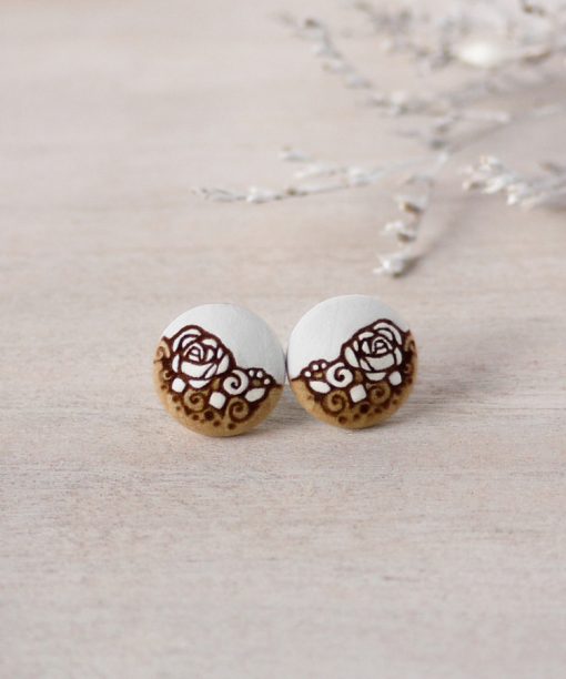 small wooden studs in white color on background