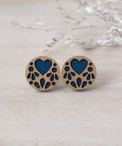 medium blue lace wooden earrings on background
