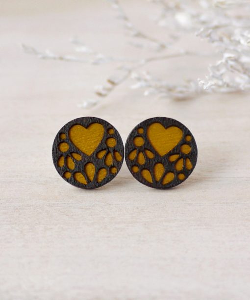 medium ochre lace wooden earrings on background