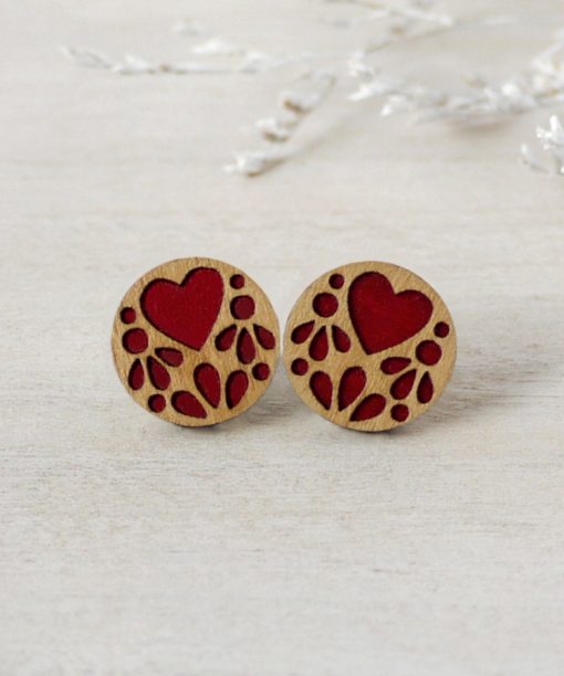 medium red lace wooden earrings on background