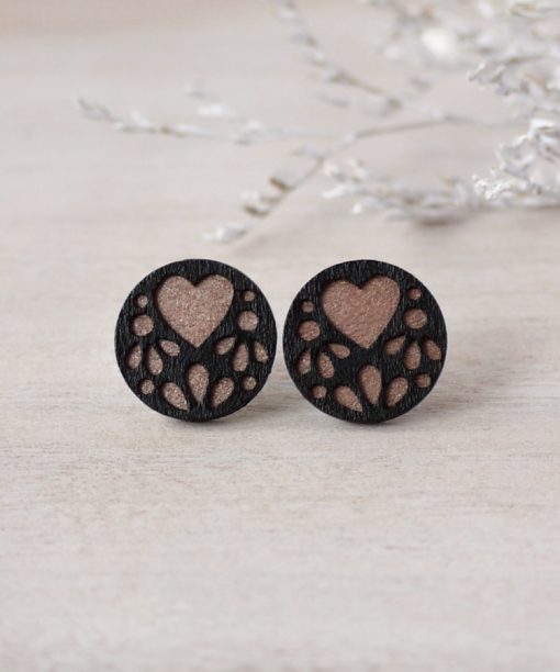 medium rose gold lace wooden earrings on background
