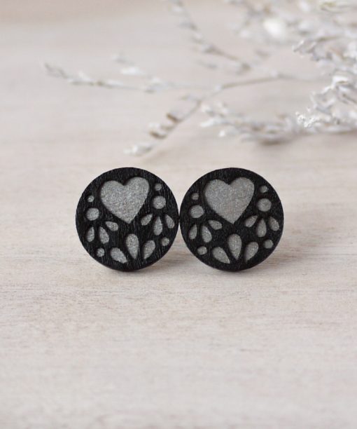 medium silver lace wooden earrings on background