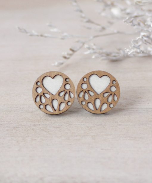 medium white lace wooden earrings on background