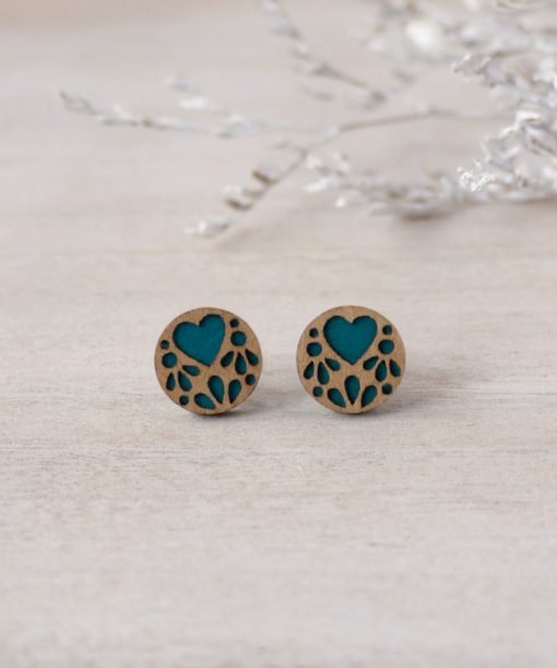 turquoise lace wooden earrings on background